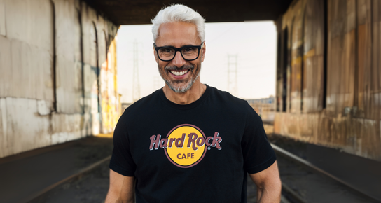 A man in a black classic logo tee