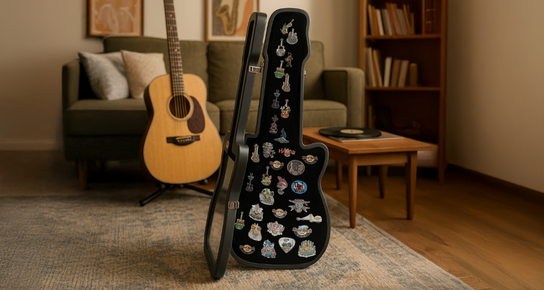 A person in an outdoor setting wearing a Hard Rock Bruce Springsteen Photograph T-shirt while wearing sunglasses and holding a backpack on one shoulder, looking to his left. 
